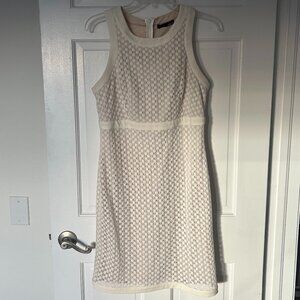 Sleeveless off-white, lined, mod crochet pattern dress